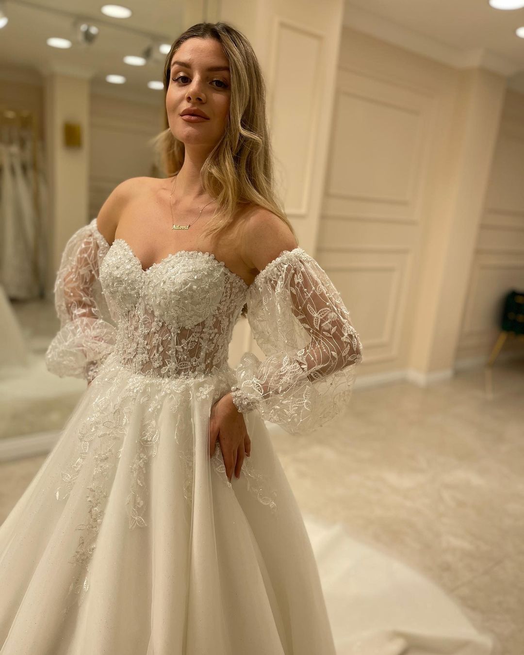 Miabel Glamorous Backless Sweetheart Long Sleeve Train Wedding Dress With Appliques Lace A-Line
