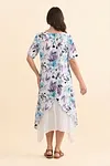 Back view of women's short sleeve floral midi dress with layered handkerchief hem