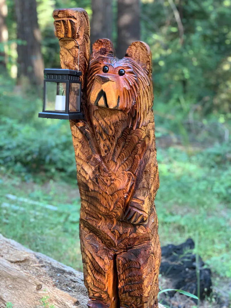 Cedar carved Bear with solar lantern