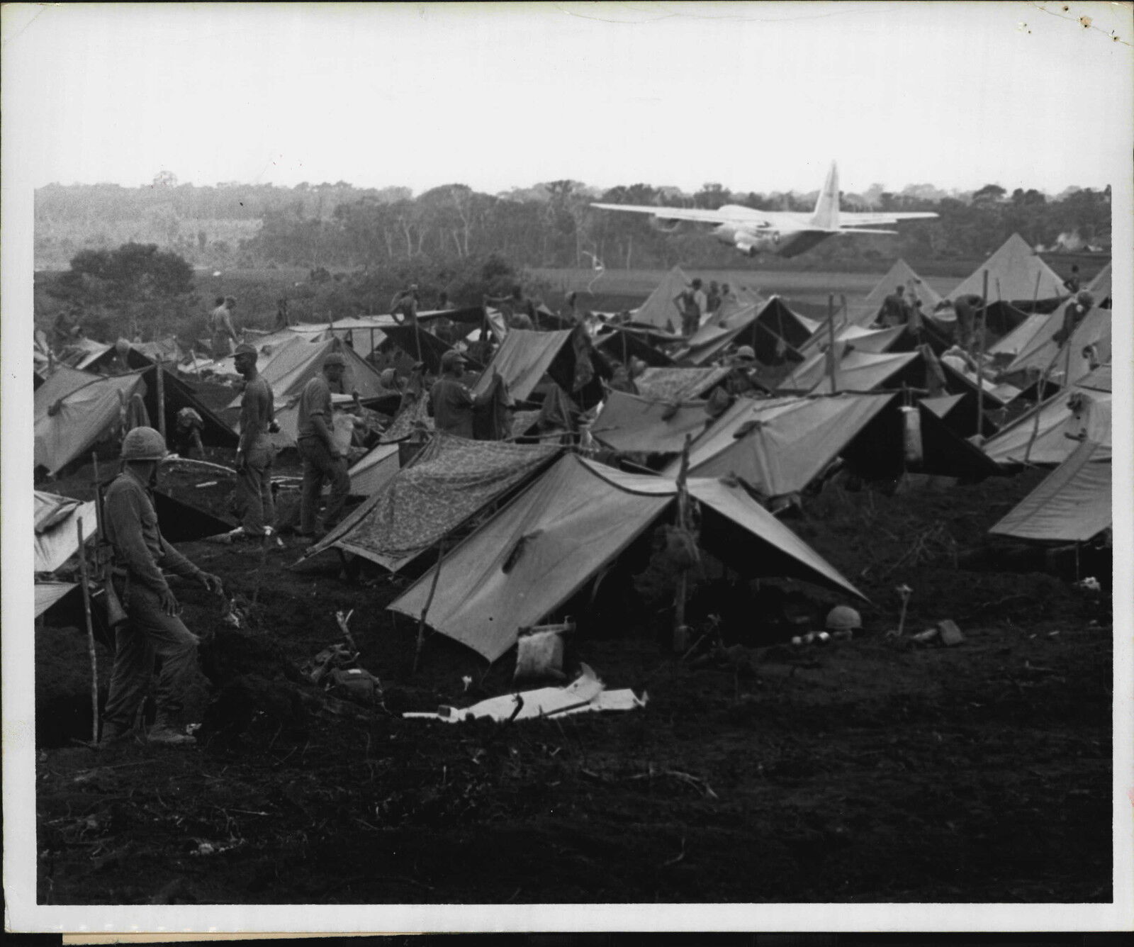 1966 US Air Force C-130 Delivers to Army Camp at Nhon Co Vietnam Press Photo Poster painting