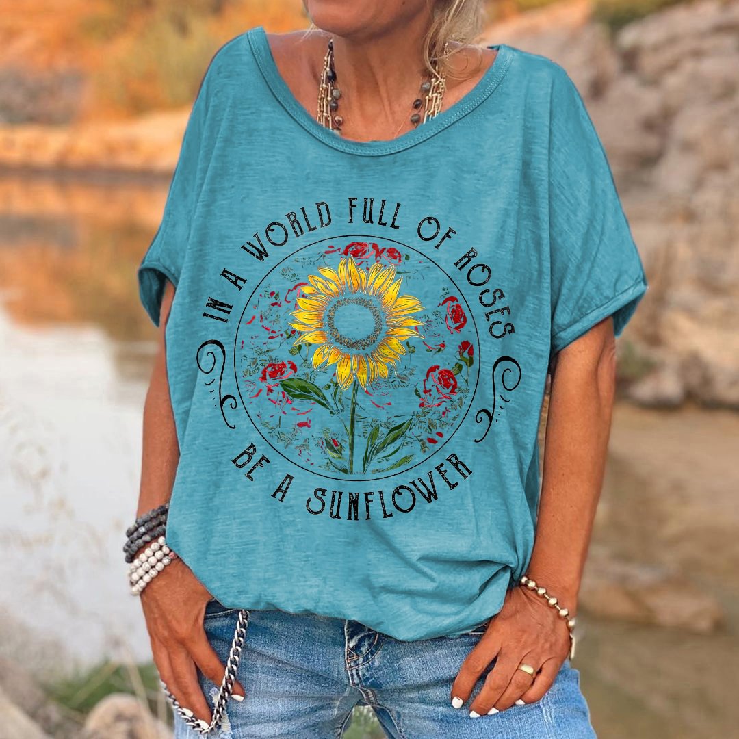 Women's In A World Of Roses Be A Sunflower Print T-shirt