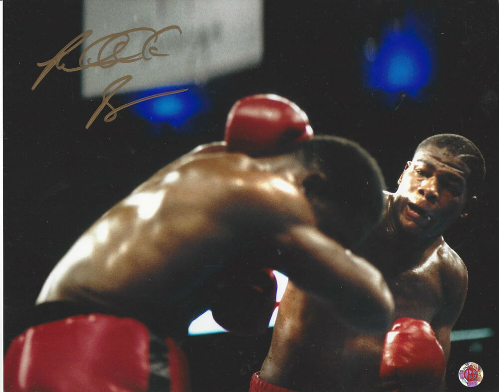 Riddick Bowe autographed 8x10 great action  Photo Poster painting vs Evander Holyfield