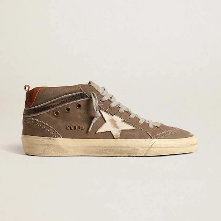 Golden Goose Mid Star de lona verde con estrella de cuero y coma negra