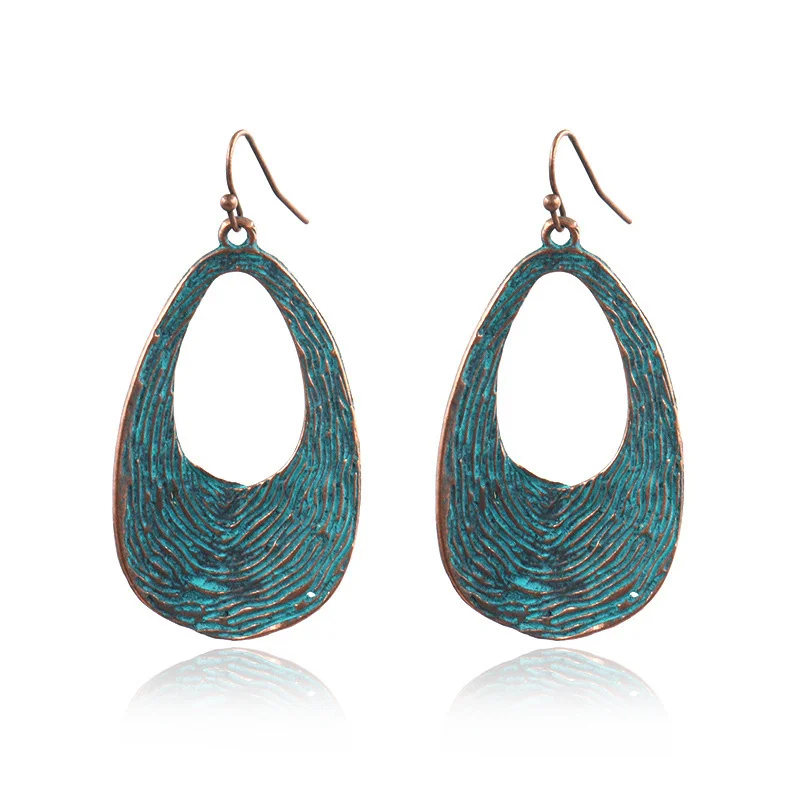 Women's Bohemian Retro Turquoise Hollow Exotic Earrings