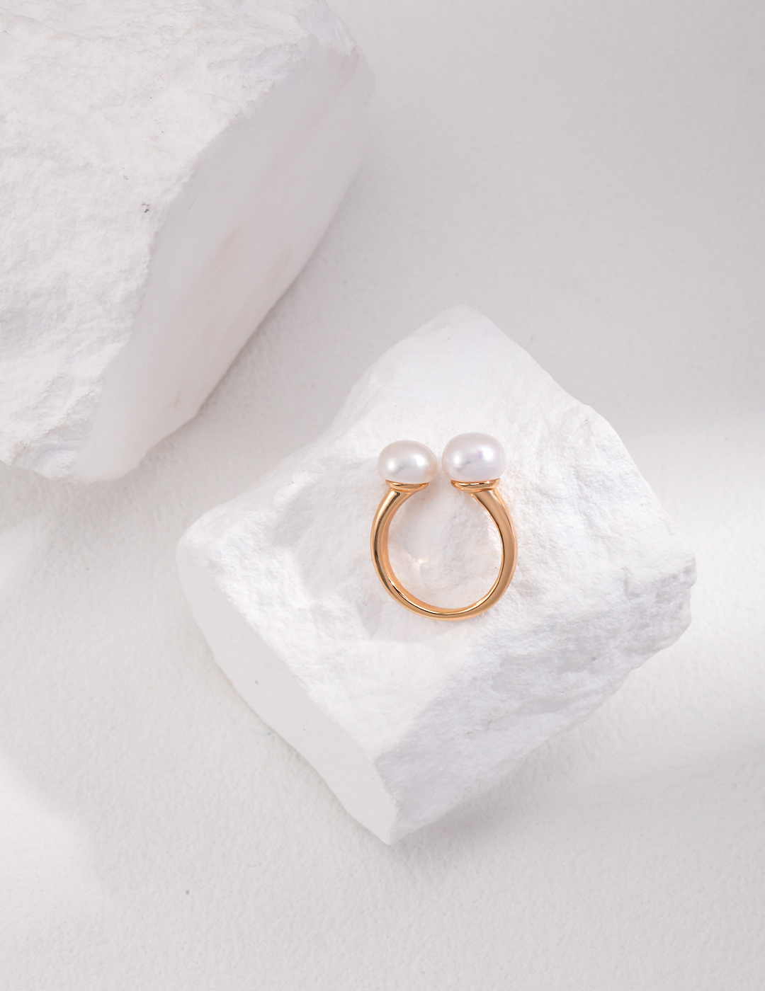 Open gold plated ring with natural pearls