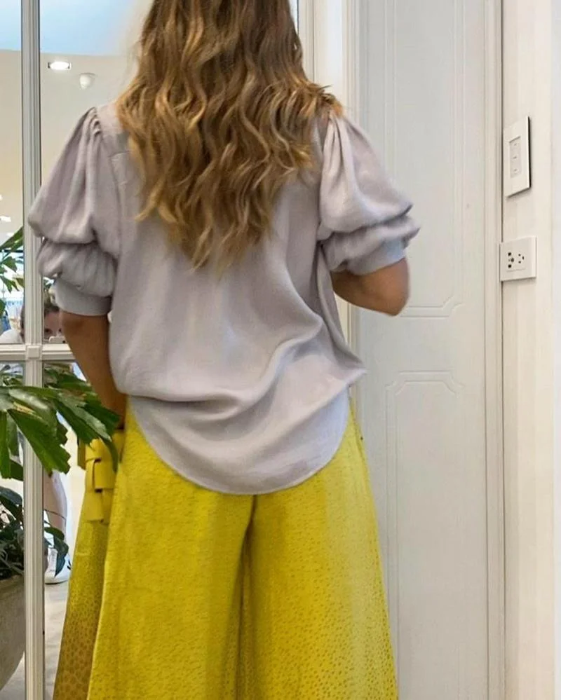 Set of solid color V-neck top & printed slacks