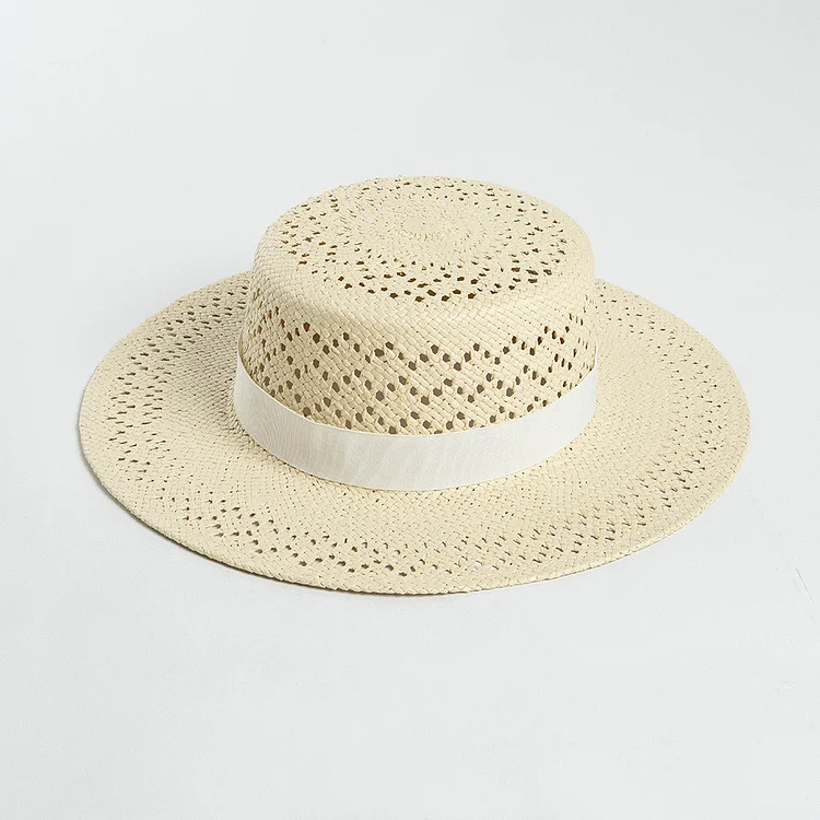 Hollow hand-knitted wide-brimmed flat-top straw hat