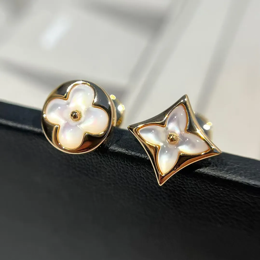 Louis Vuitton Asymmetric Mother of Pearl Stud Earrings