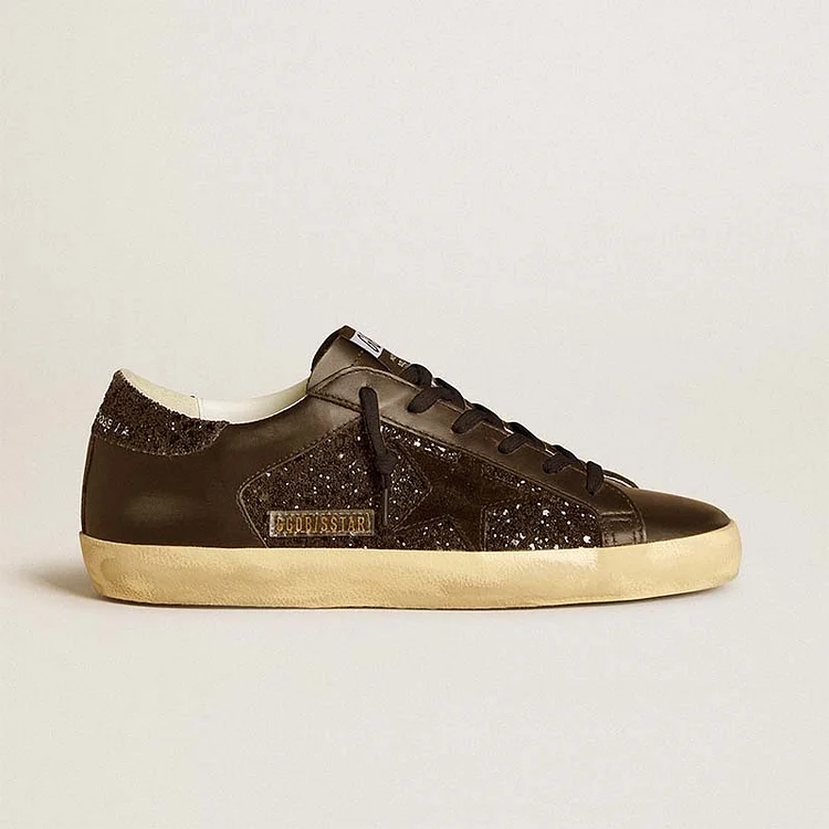 Golden Goose Super-Star Mujer de purpurina negra con estrella de ante negro e inserciones de cuero