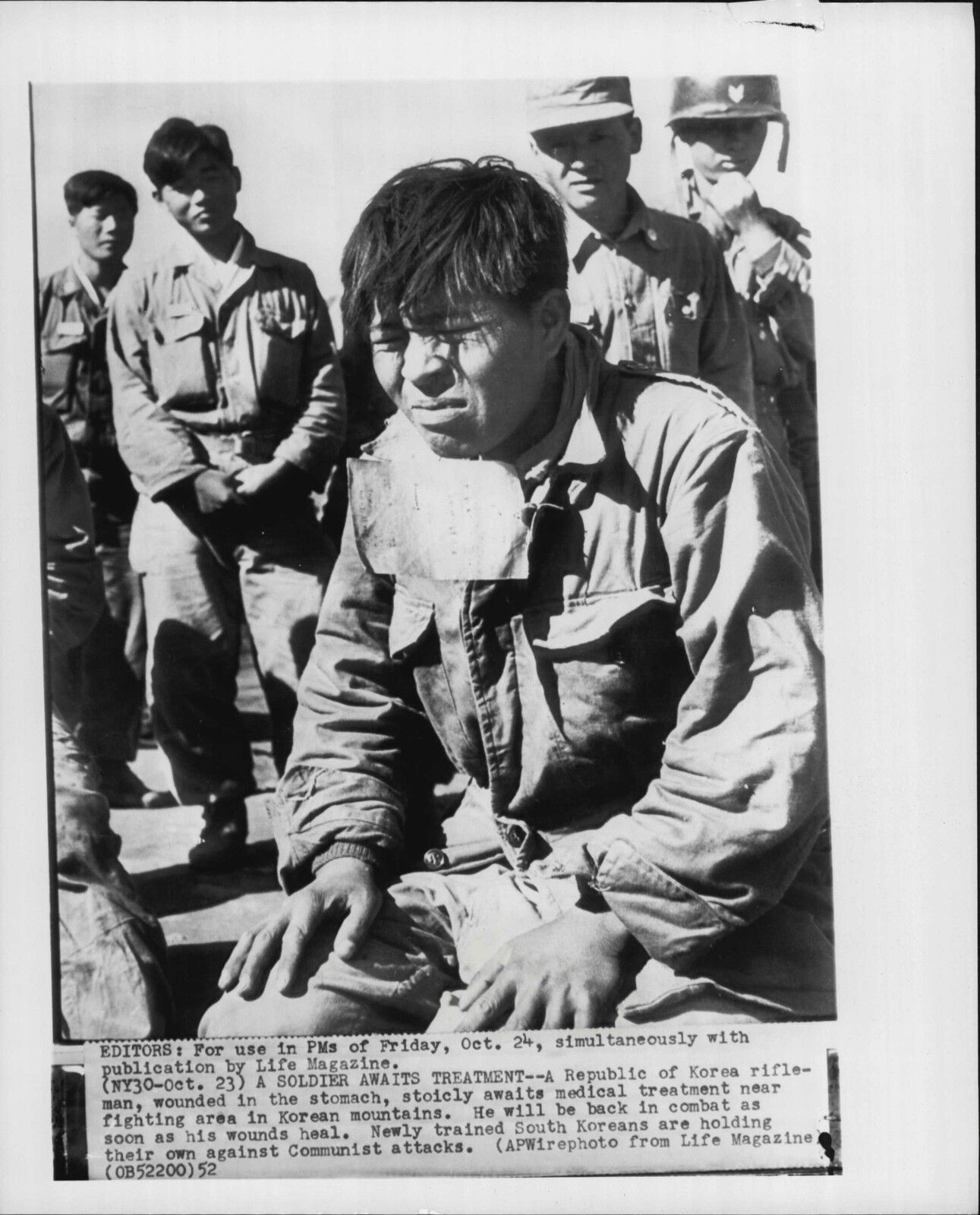 Wounded South Korean Soldier Awaits Treatment 1952 Korea War Press Photo Poster painting