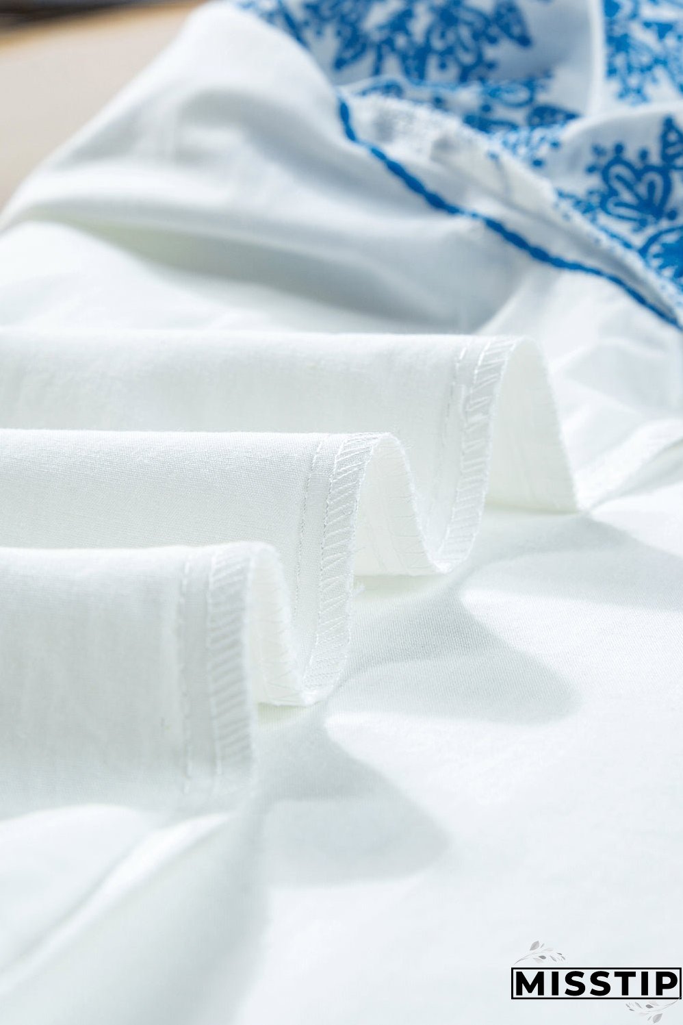 Ruffled Mock Neck Cap Sleeve Blouse