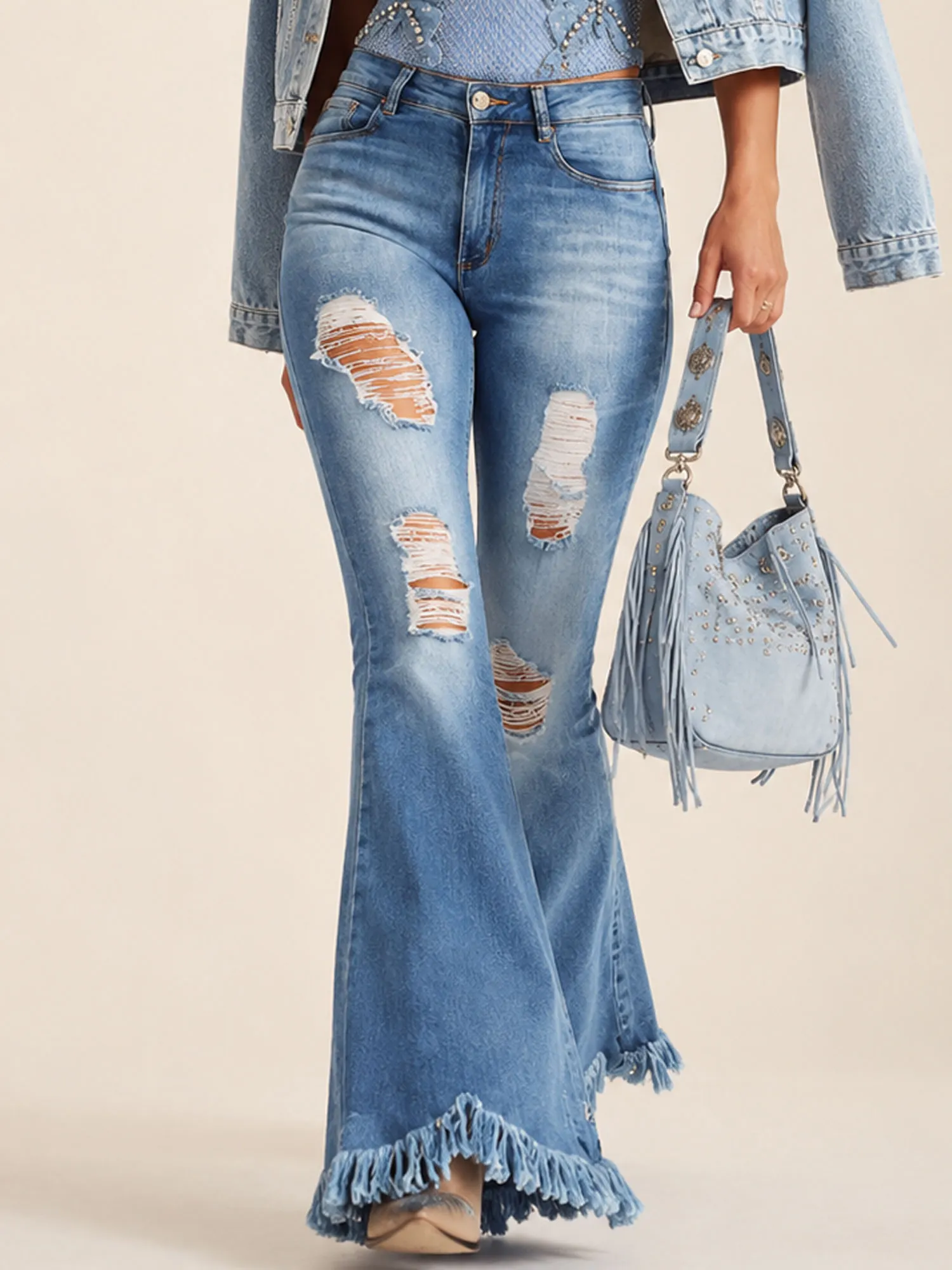 Perfect for a Rodeo Horse Riding Event &mdash; 2026 Spring/Autumn Women Blue Distressed Ripped Fringe Hem Flare Denim Jeans