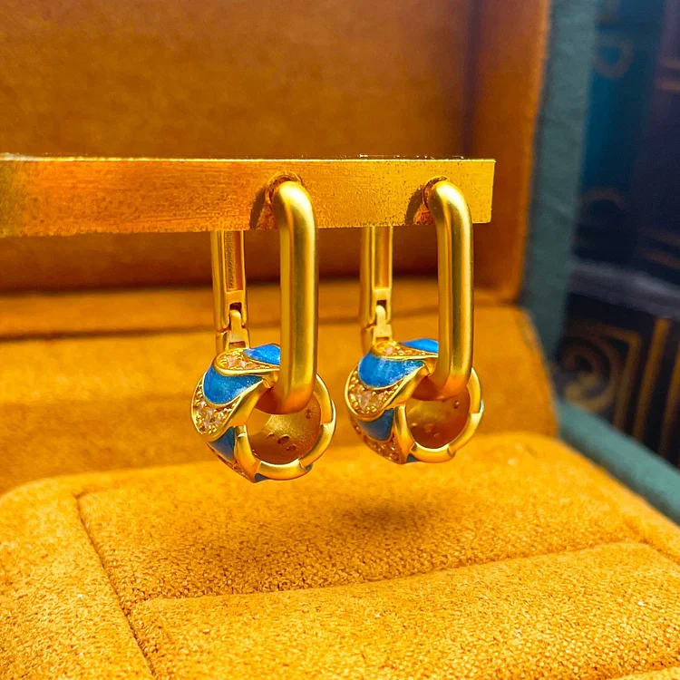 Vintage earrings with zirconium enamel inlay