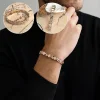 Bracelet magn&eacute;tique en cuivre avec tr&egrave;fle porte-bonheur pour femme