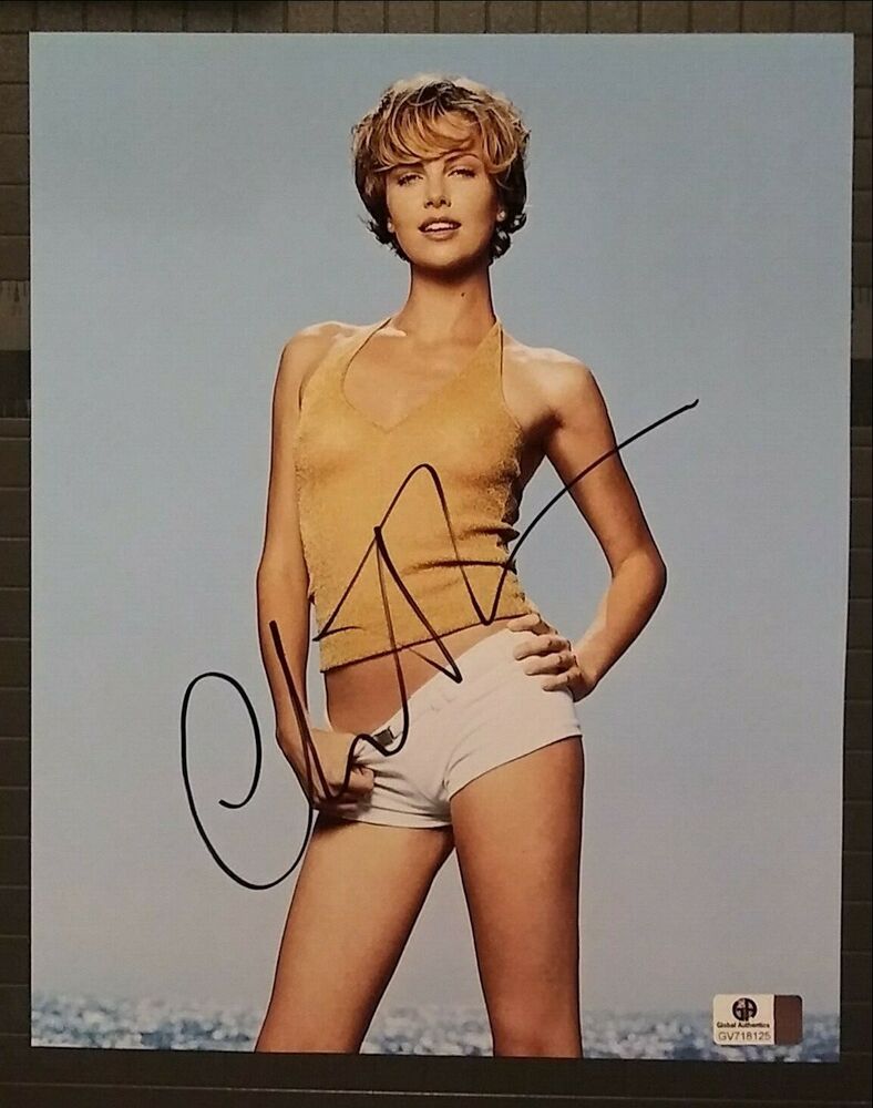 Charlize Theron signed 8x10 GAI