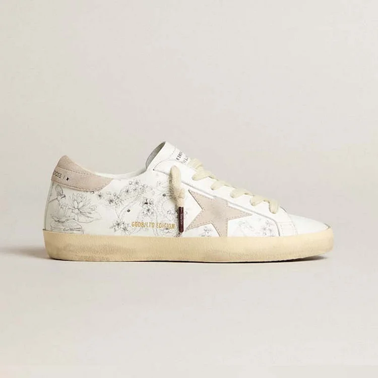 Golden Goose Super-Star Men LTD CNY de cuero blanco con escritura en la parte superior