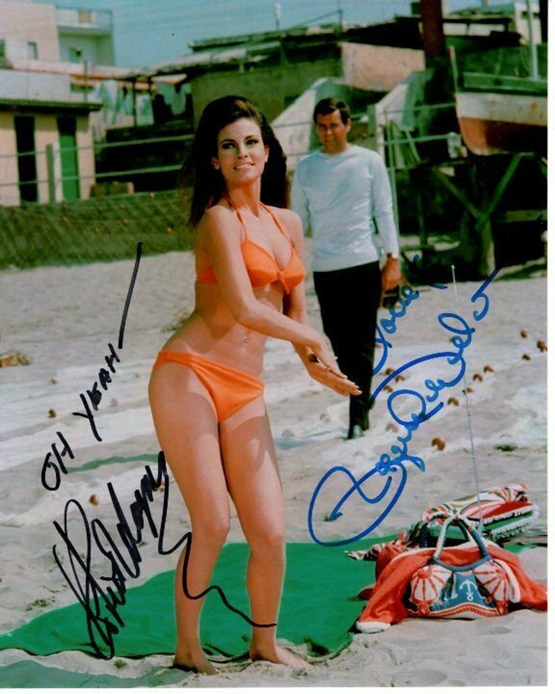 Robert wagner and raquel welch signed the biggest bundle of them all Photo Poster painting