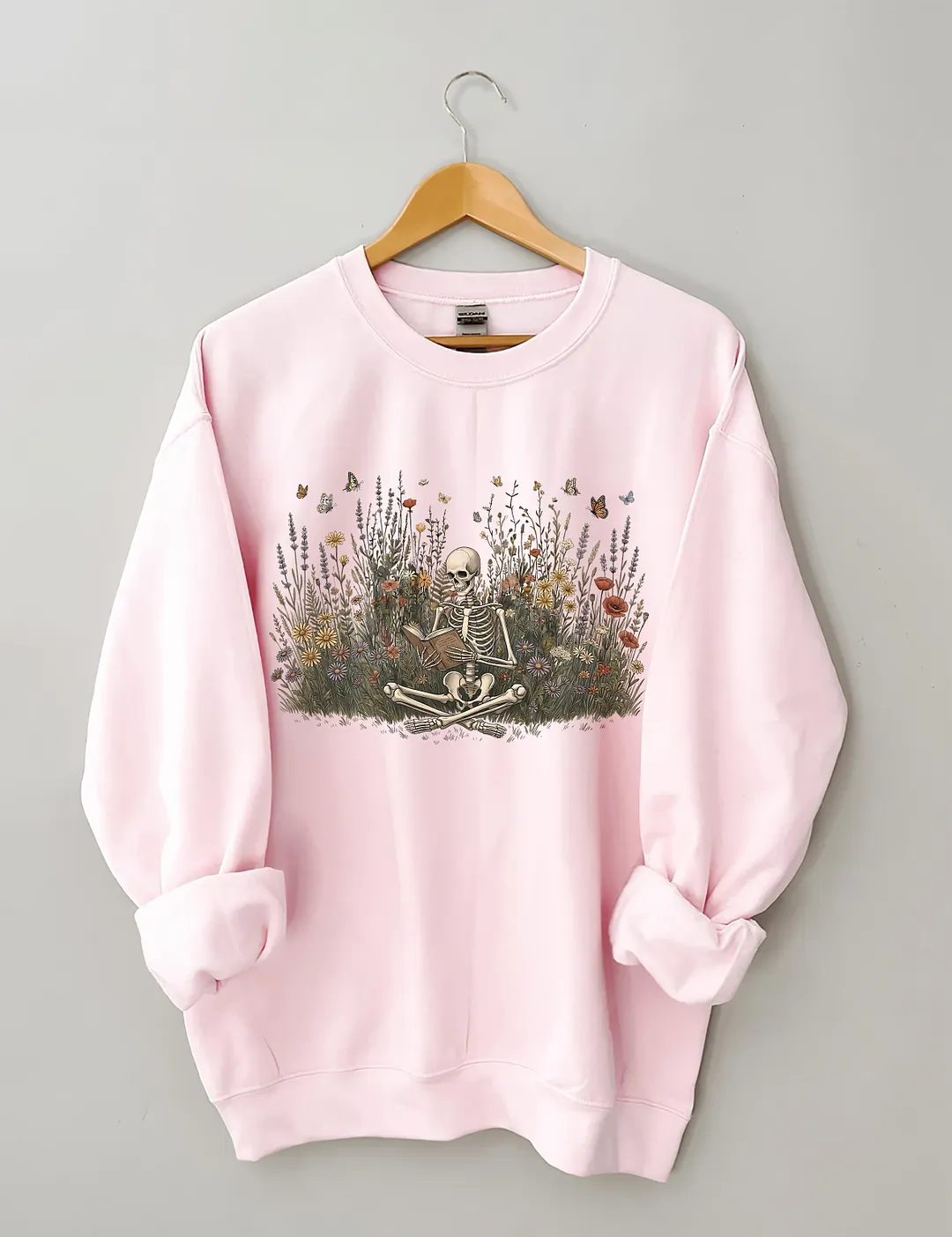 Skeleton Reading Book Sweatshirt