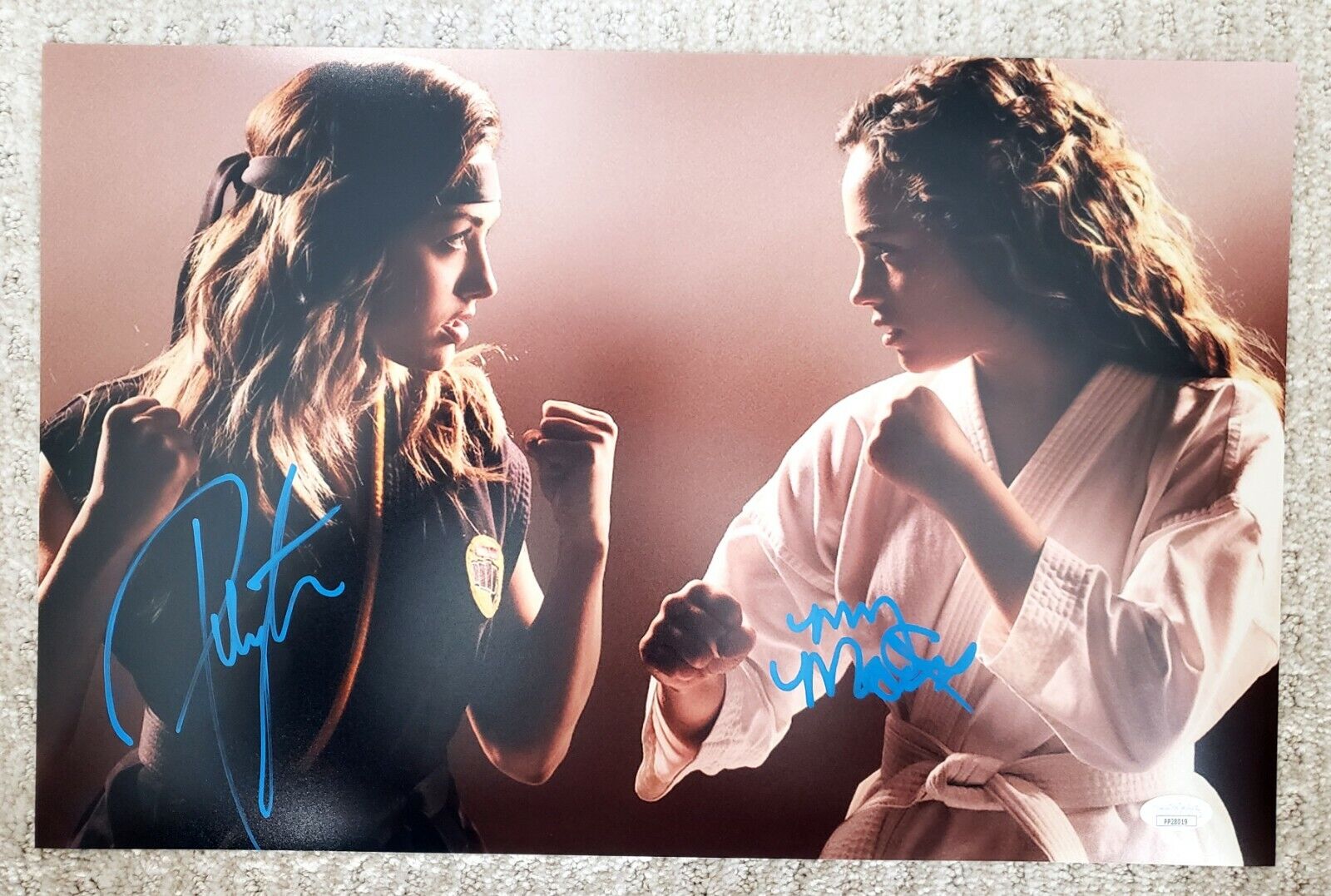 11x17 Autographed by Peyton List and Mary Mouser in Cobra Kai. Rare! JSA