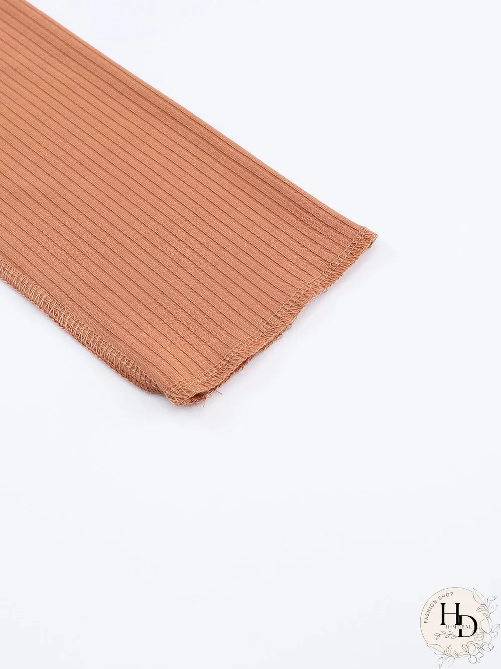 Knit Top with Exposed Seam Detail in Brown Color Block