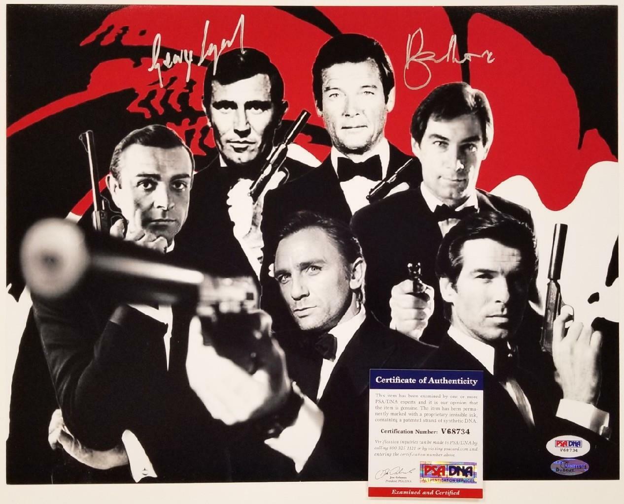 Roger Moore & George Lazenby signed 007 James Bond 11x14 Photo Poster painting Autograph PSA COA