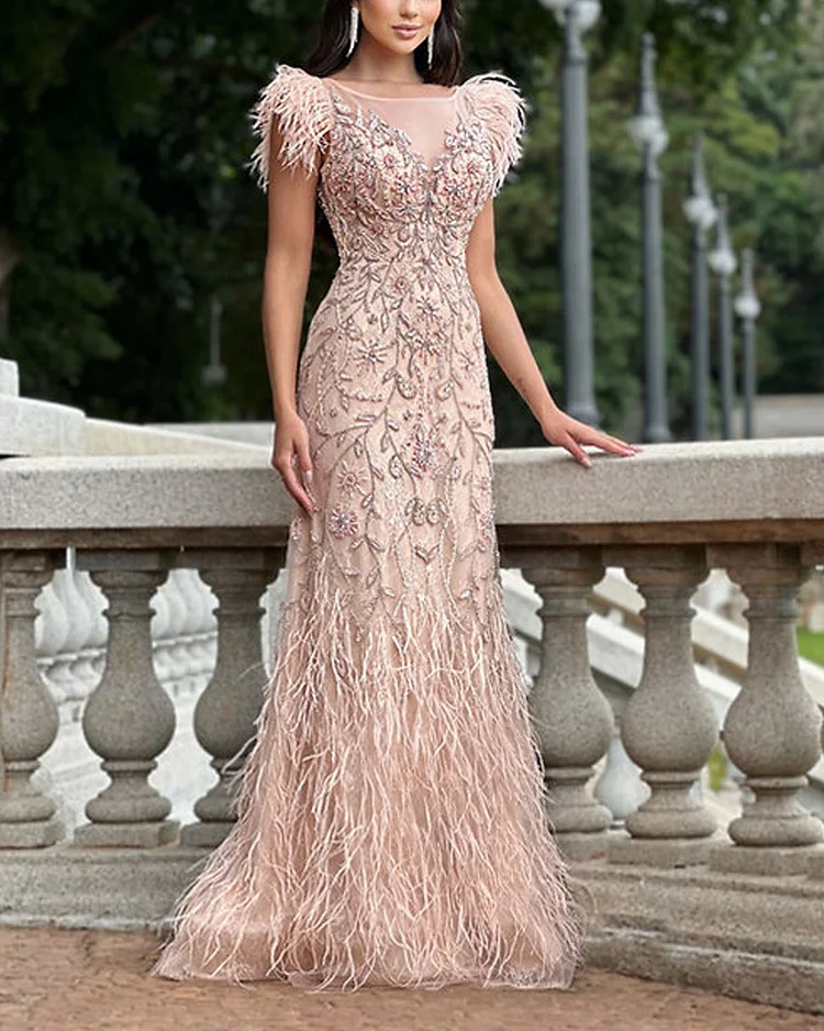 Feather embroidered lace gown