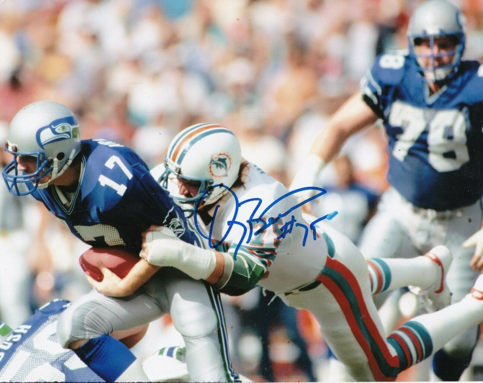 DOUG BETTERS MIAMI DOLPHINS ACTION SIGNED 8X10