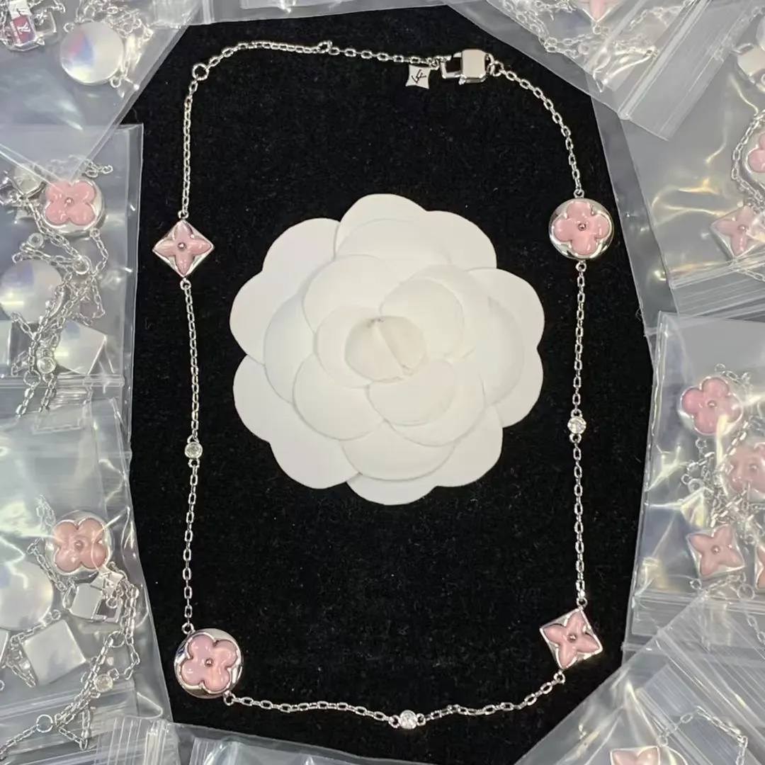 Louis Vuitton Pink Mother of Pearl Star Sun Necklace