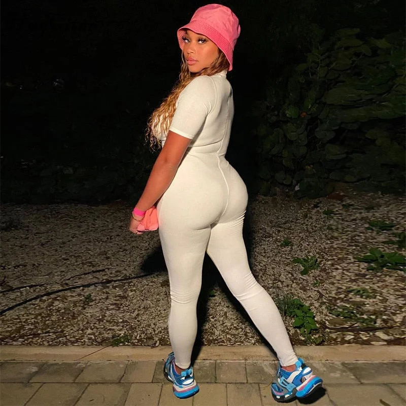 Hugcitar 2021 Short Sleeve Solid Zip Up O-Neck Skinny Bodycon Jumpsuit Spring Summer Women Fashion Streetwear Lounge Wear Romper