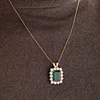 18K Yellow Gold 11ct Emerald Cut Lab Zambian Emerald Halo Pendant Necklace