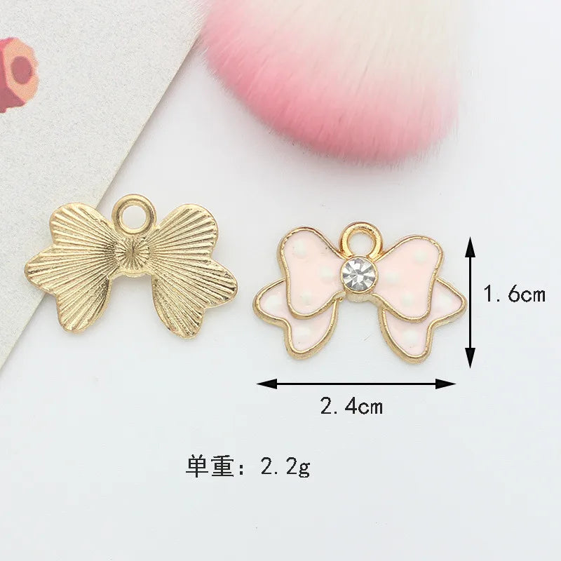 10 PCS/Package 1.5 * 20mm 14 * 14mm 7 * 12mm Alloy Rhinestones Pearl Number Heart Shape Bow Knot Polished Pendant