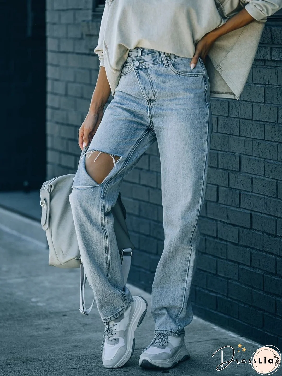 Distressed Asymmetric Waist Jeans