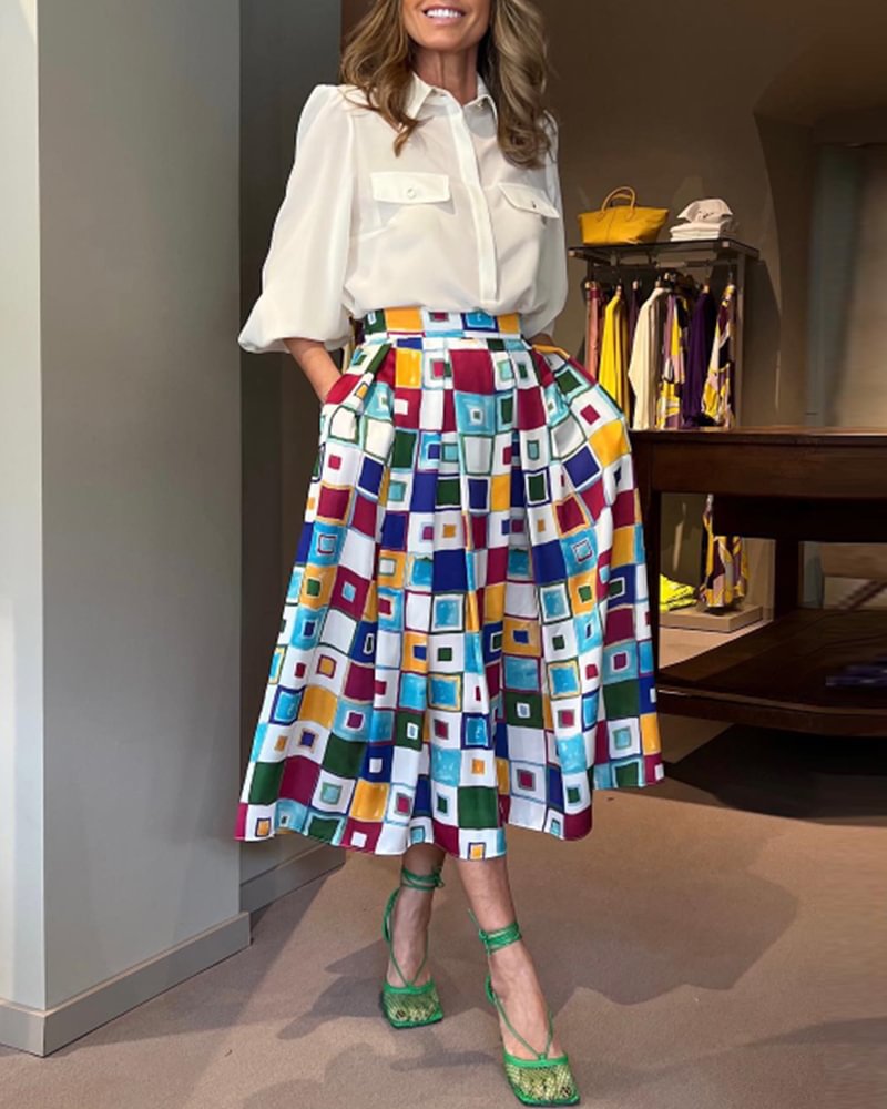 Contrasting geometric print blouse+skirt suit