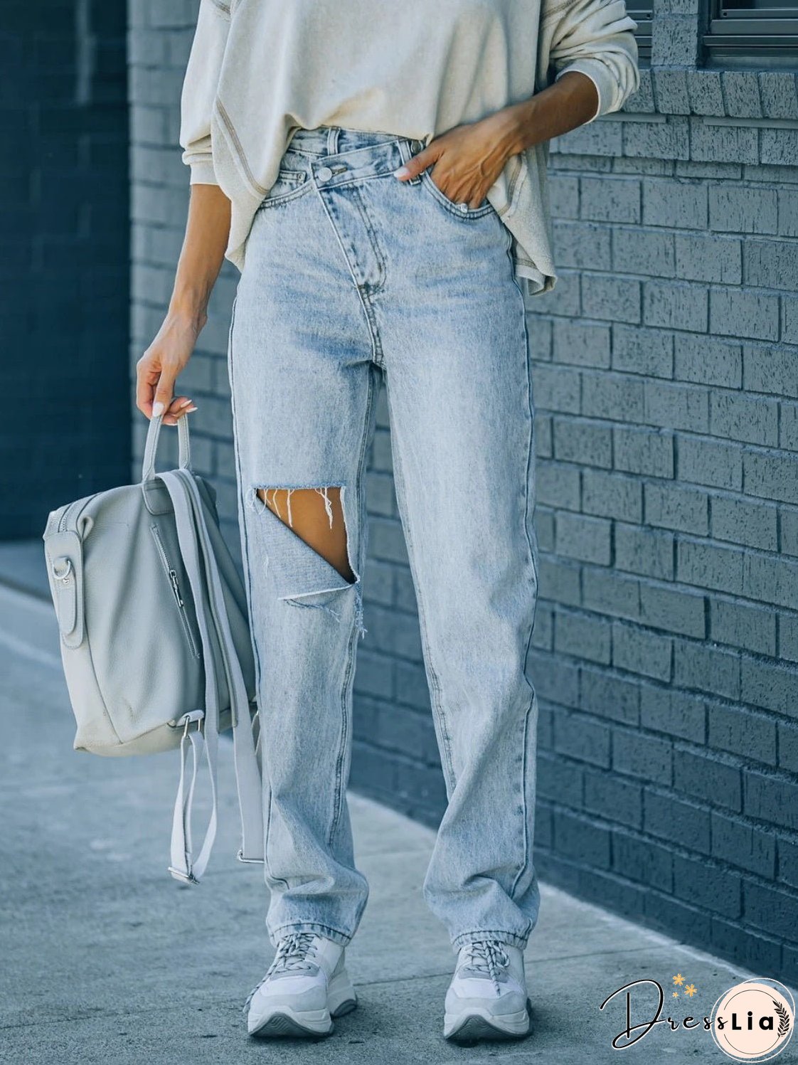Distressed Asymmetric Waist Jeans