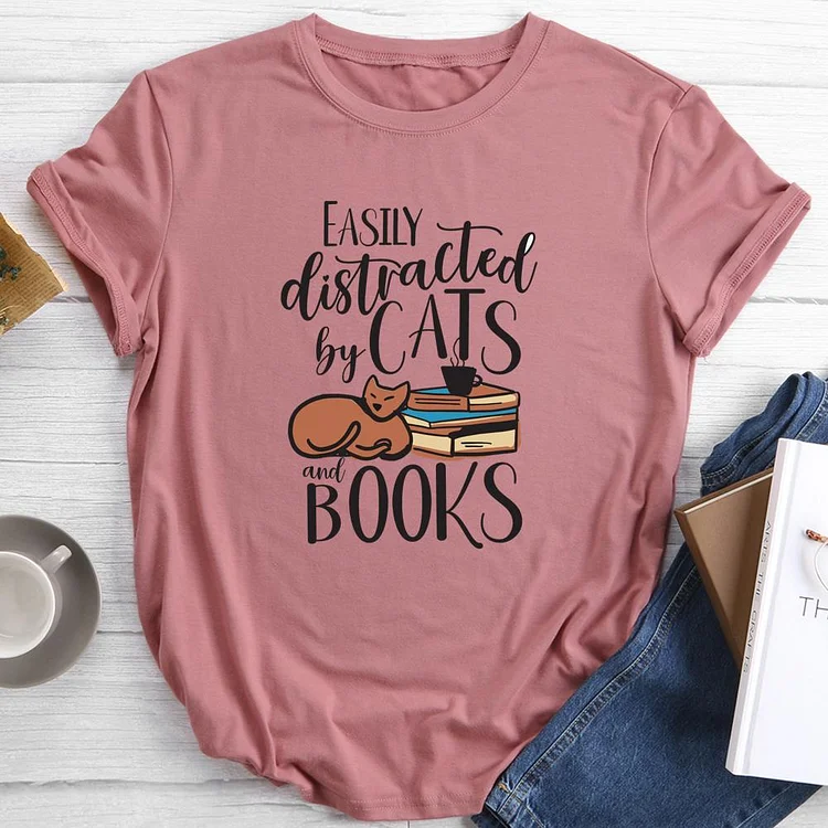 Easily distracted by cats and books Round Neck T-shirt