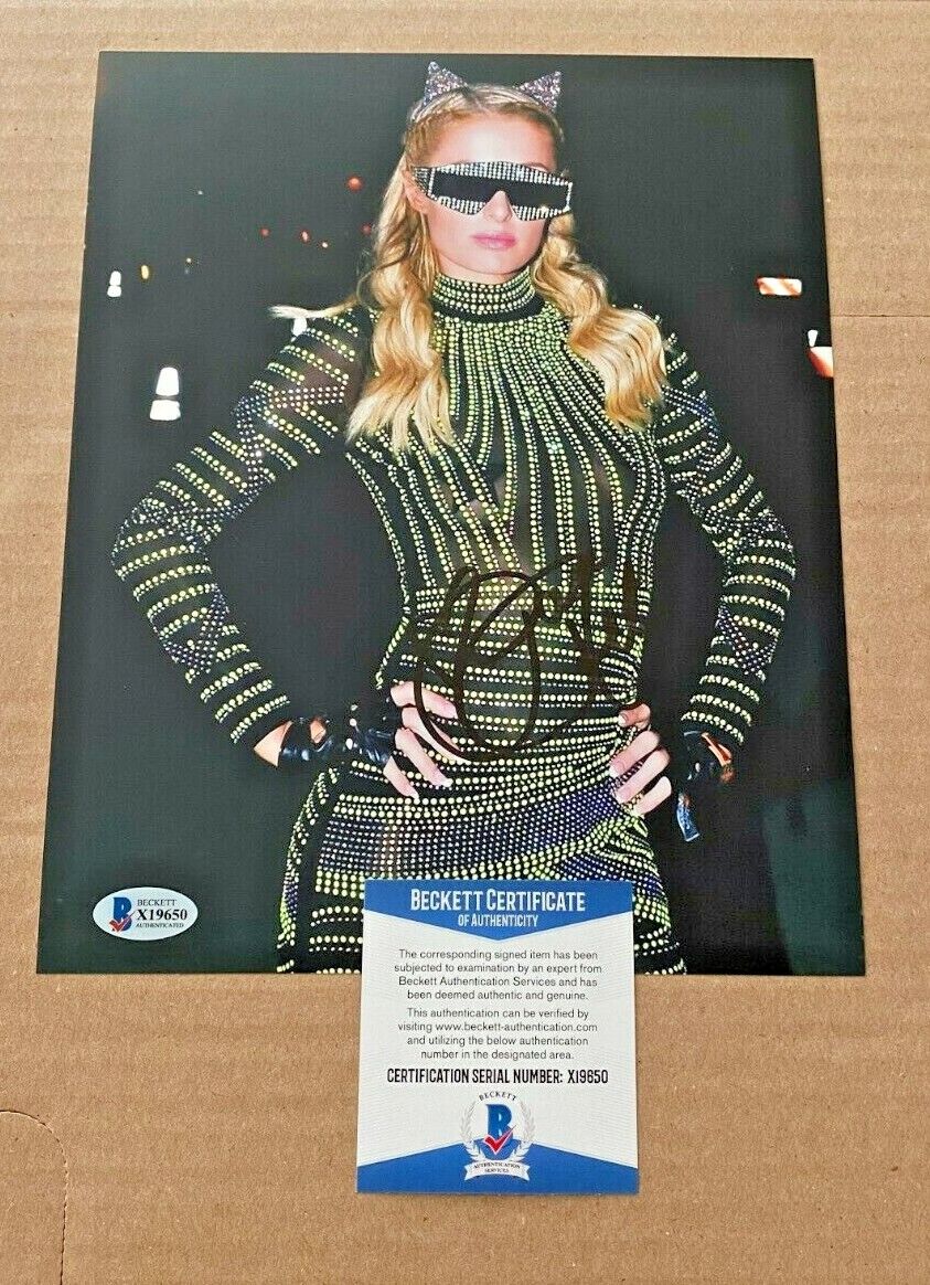 PARIS HILTON SIGNED SEXY 8X10 Photo Poster painting BECKETT CERTIFIED BAS #7