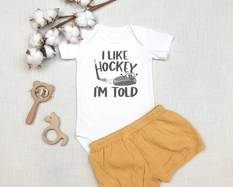 I Like Hockey I'm Told Baby Bodysuit|S15