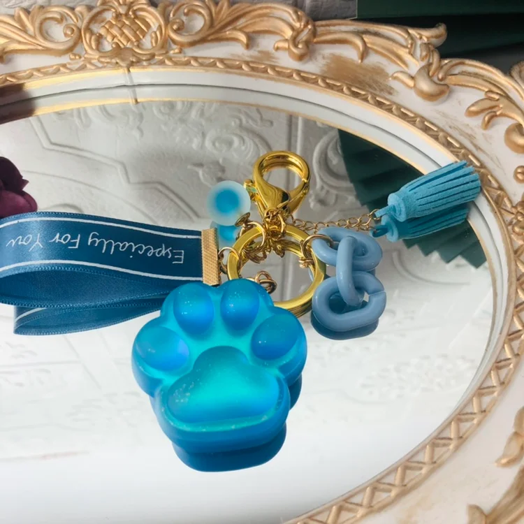 Deep blue pearlescent handmade cat claw keychain