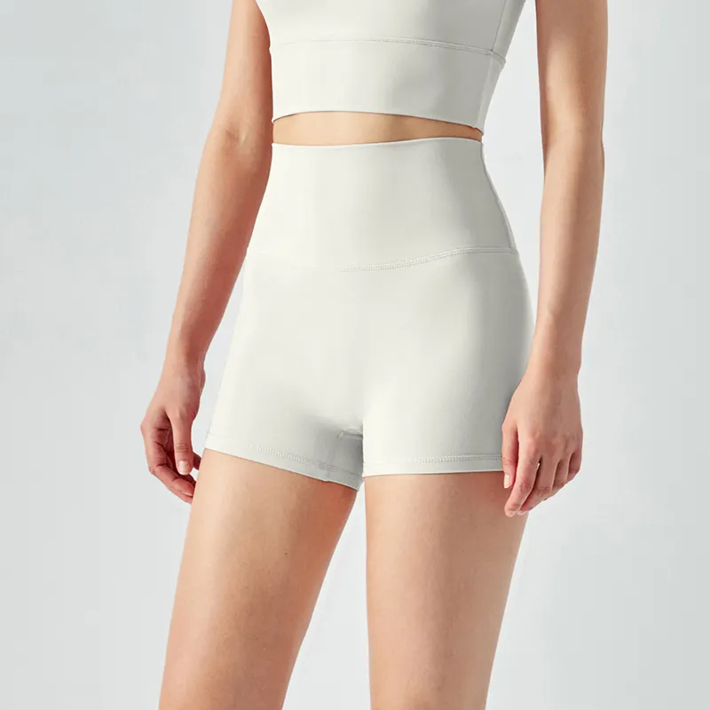 Shop high rise no front seam squat proof tummy control flexible flatting hot yoga shorts womens online on Hergymclothing Ivory White