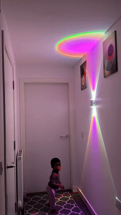 Rechargeable RGB motion sensor light showing ambient color effects