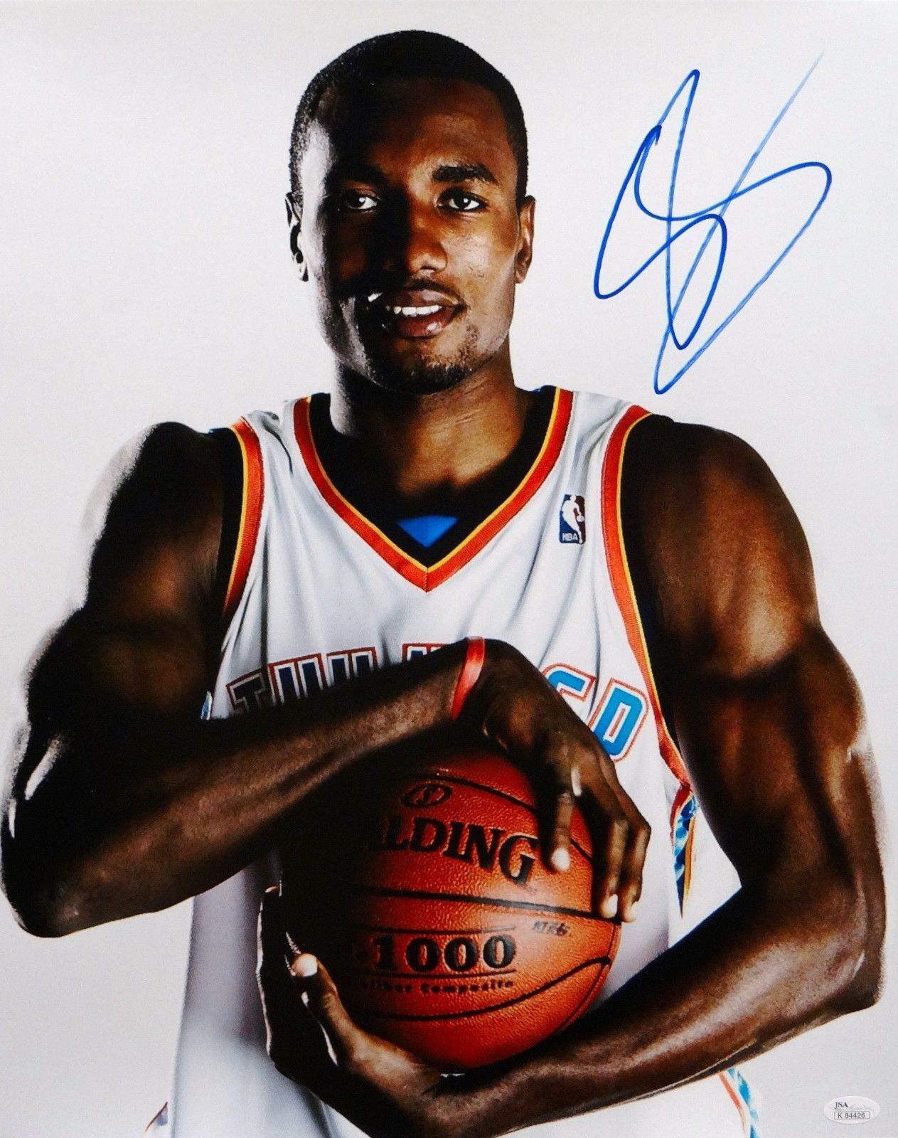 Serge Ibaka Autographed 16x20 Holding Basketball Photo Poster painting- JSA Authenticated