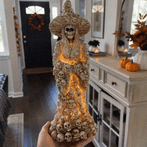 Ivory Bone glowing skull witch Halloween statue