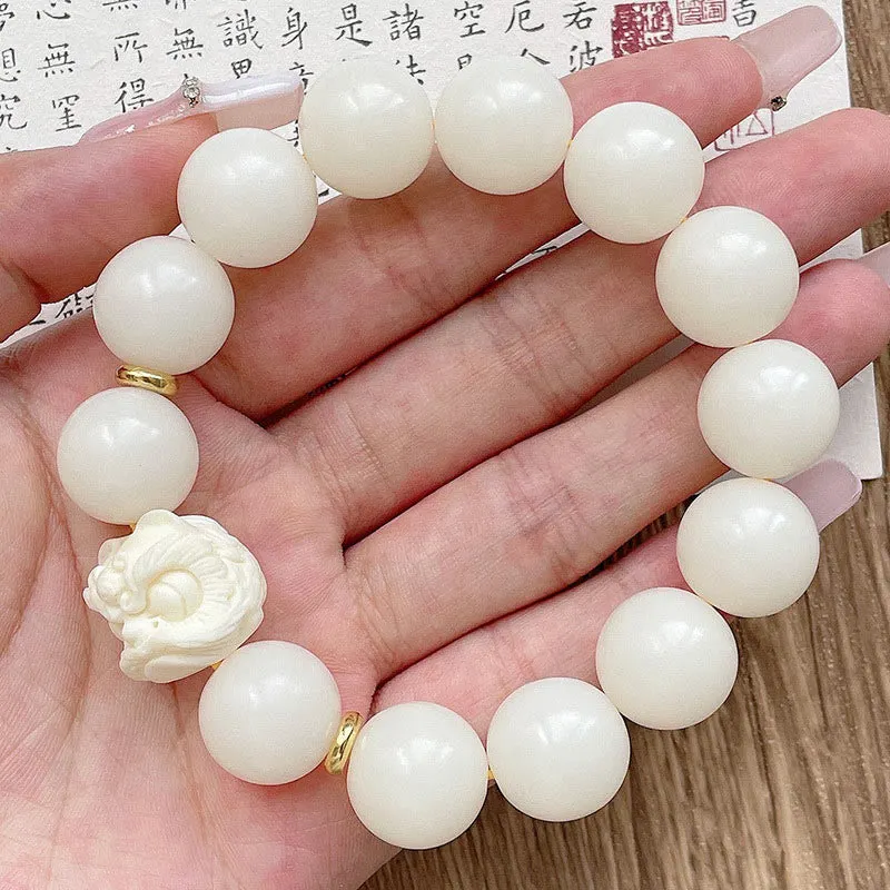 Silver Sheen Obsidian Bodhi Seed Ivory Fruit Dancing Lion Protection Bracelet