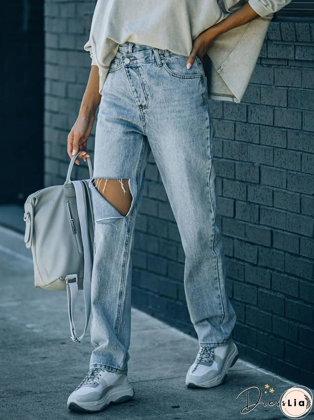 Distressed Asymmetric Waist Jeans