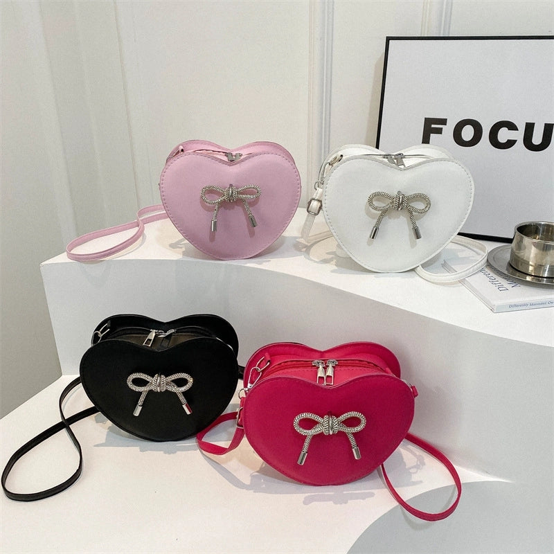 Women's Medium Pu Leather Solid Color Bow Knot Streetwear Heart-shaped Zipper Crossbody Bag