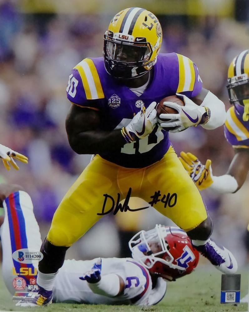 Devin White Autographed LSU 8x10 PF Photo Poster painting w/ Ball vs LA Tech - Beckett Auth *Blk