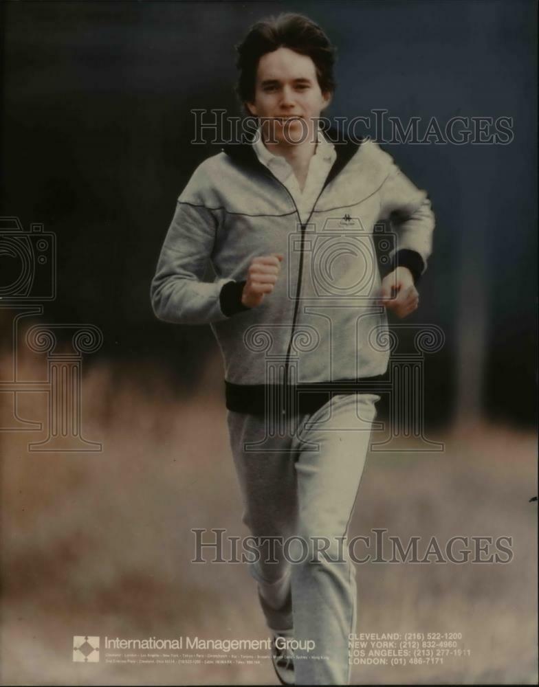 Press Photo Poster painting Young man jogging - cvp98799