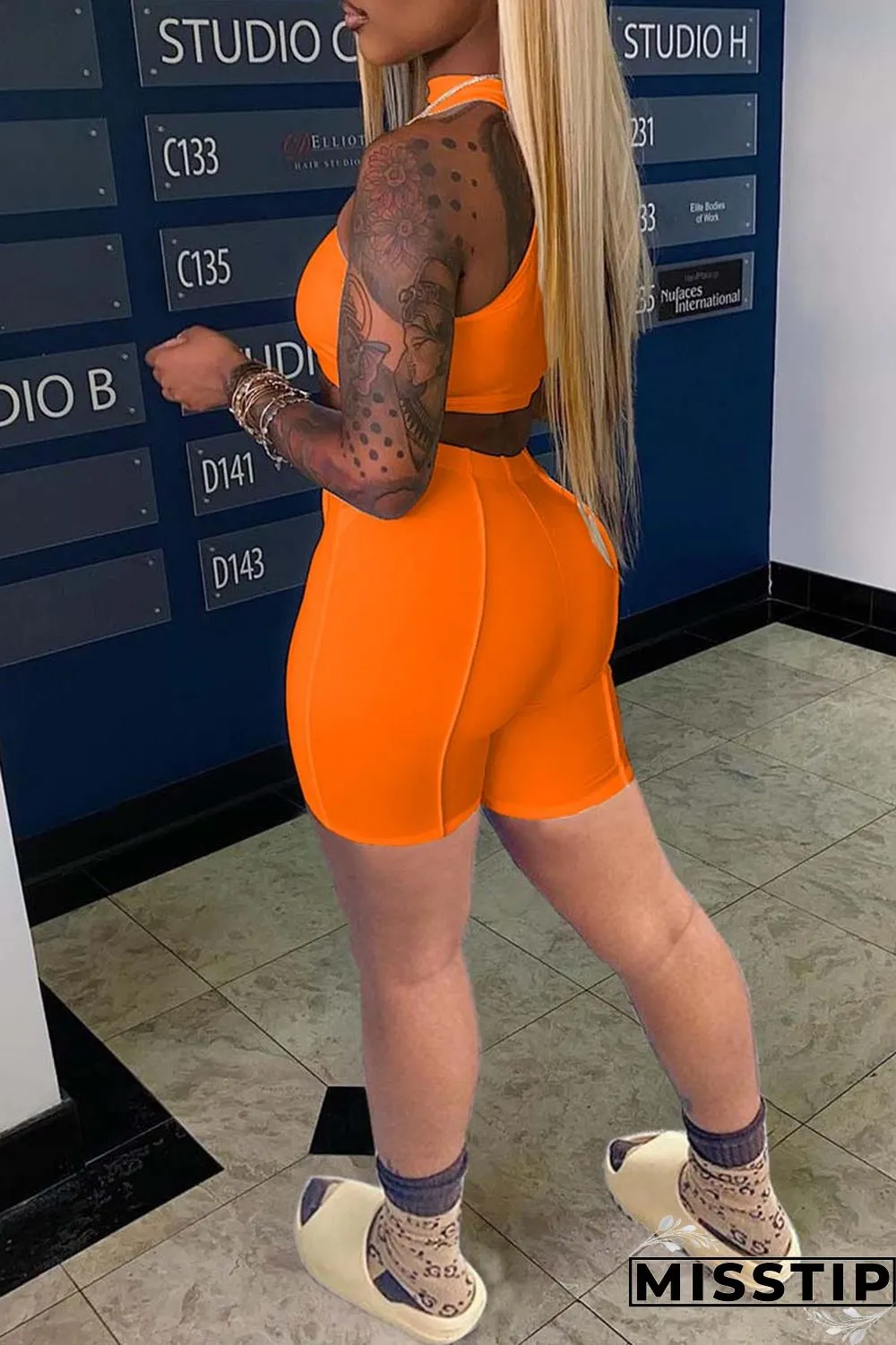 Orange Sexy Casual Solid Hollowed Out Half A Turtleneck Sleeveless Two Pieces