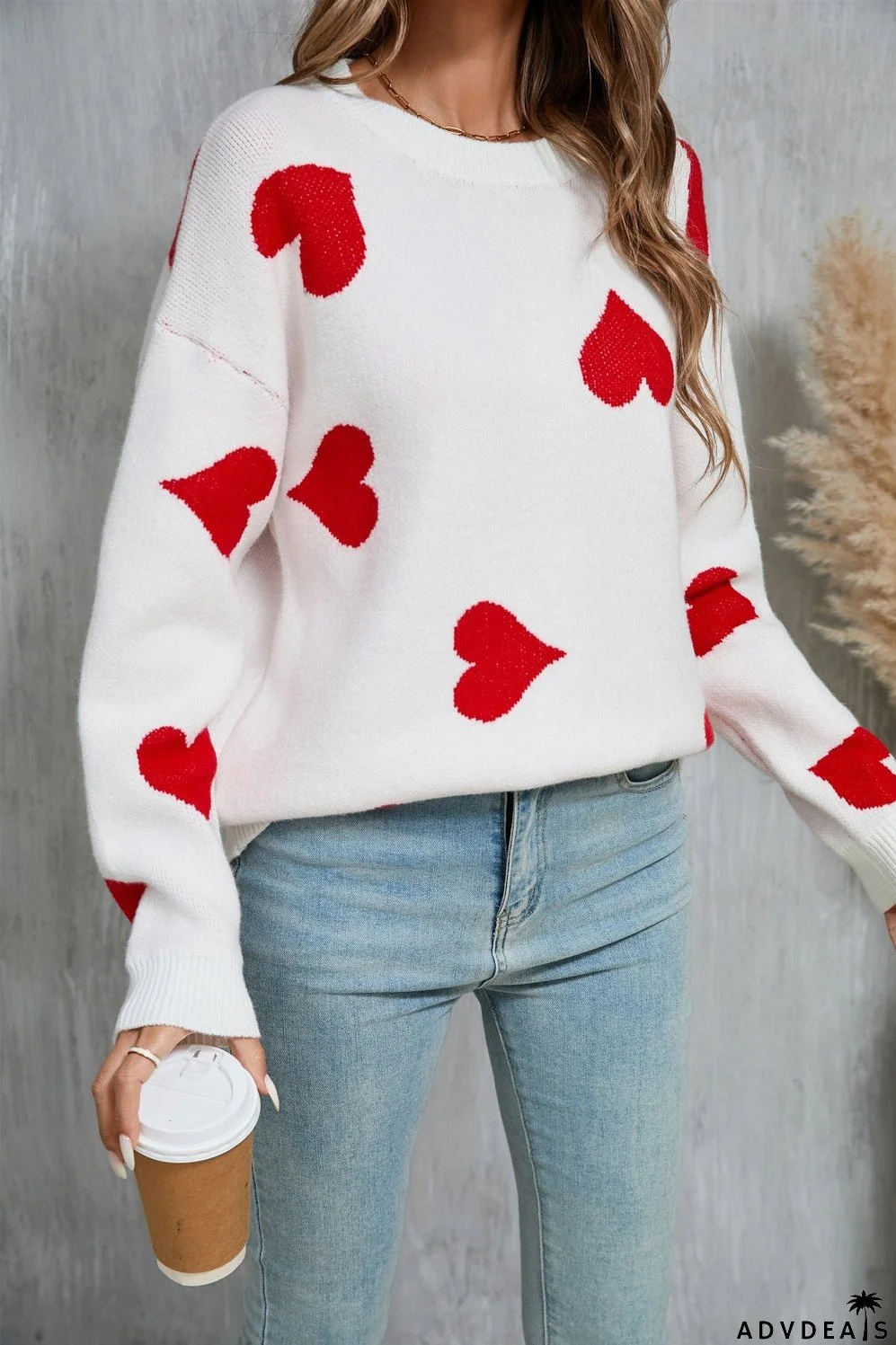 Heart-shaped crew neck sweater with dropped shoulders