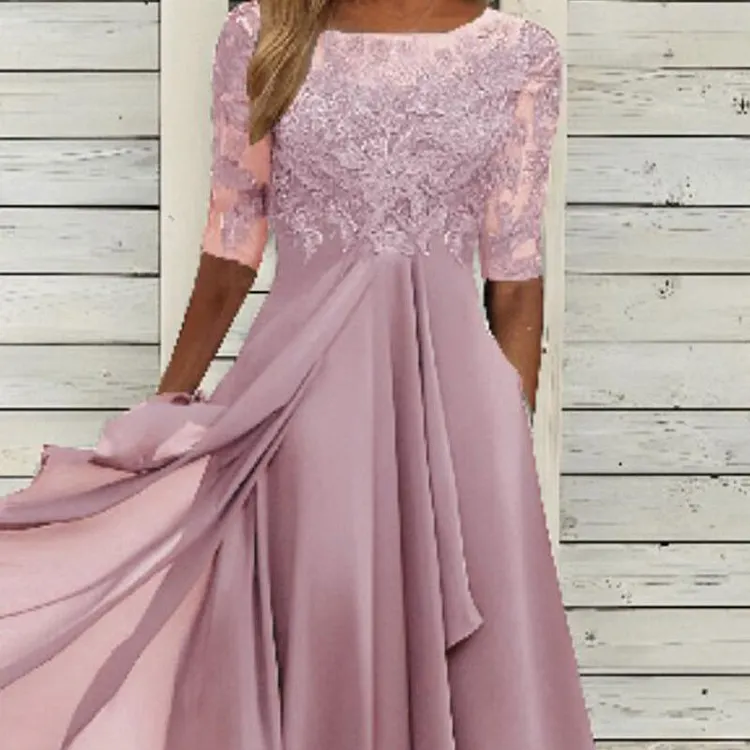 Abito elegante da cocktail fluido con ricami